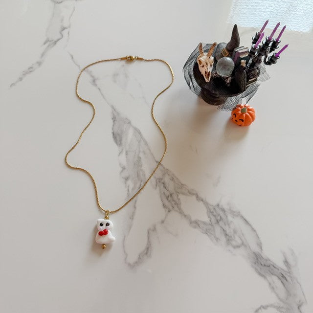 bow tie ghost · gold plated snake chain