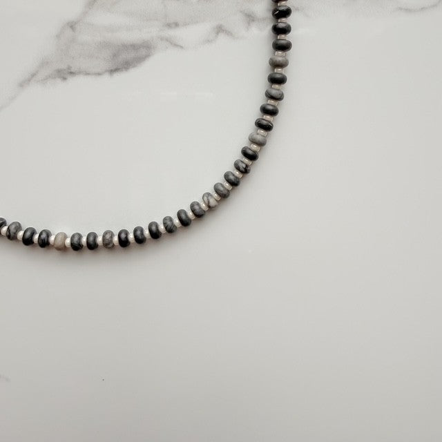the void • black network beaded necklace