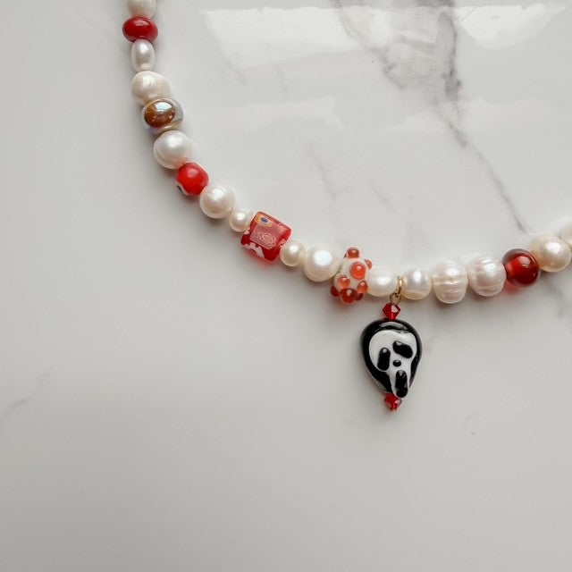 do you like scary movies• half beaded half pearl necklace