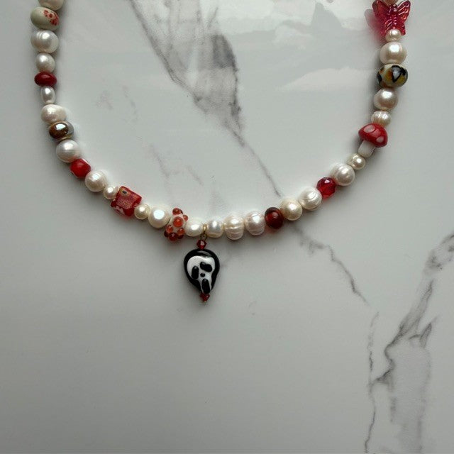 do you like scary movies• half beaded half pearl necklace