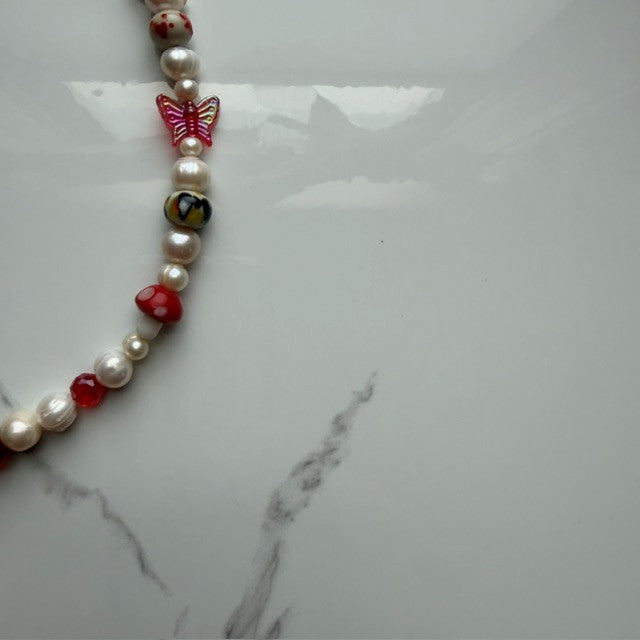 do you like scary movies• half beaded half pearl necklace
