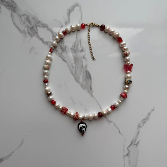 do you like scary movies• half beaded half pearl necklace