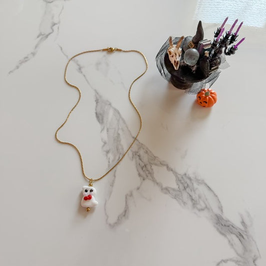 bow tie ghost · gold plated snake chain