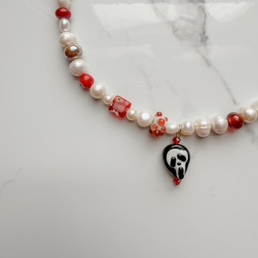 do you like scary movies• half beaded half pearl necklace
