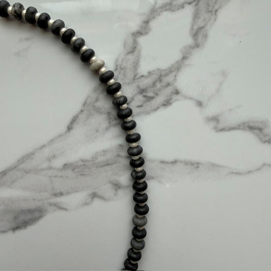 the void • black network beaded necklace