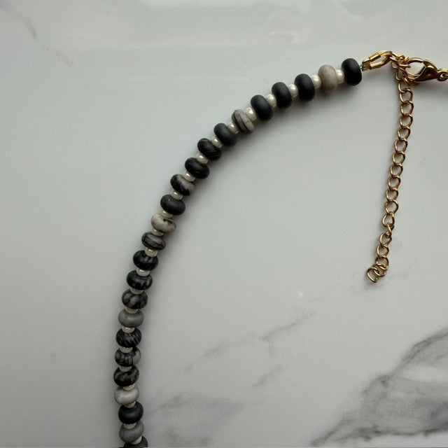 the void • black network beaded necklace