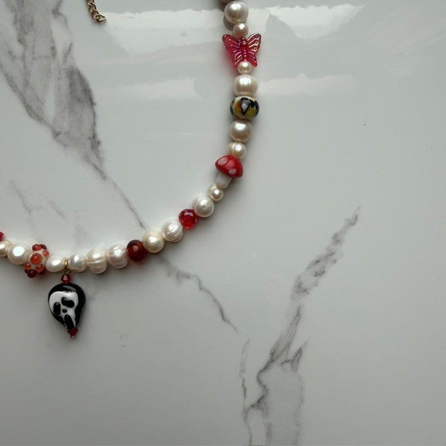 do you like scary movies• half beaded half pearl necklace