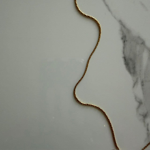 bow tie ghost · gold plated snake chain