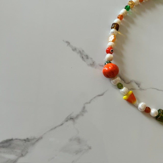 the bee’s knees • half beaded half pearl necklace