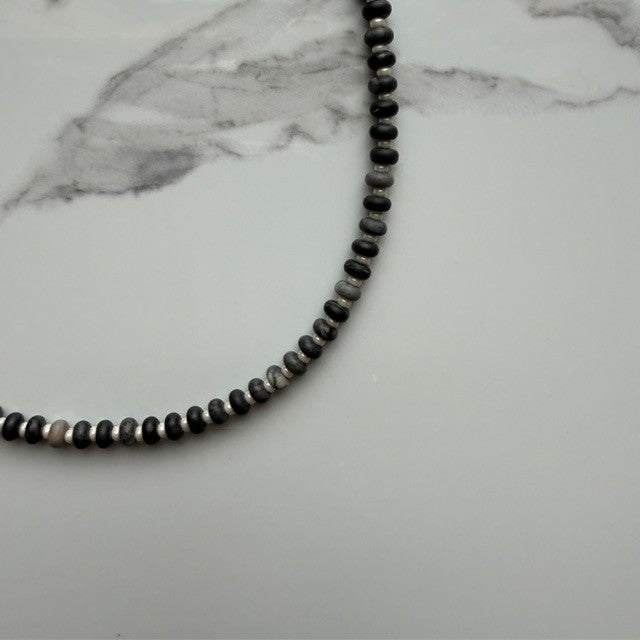 the void • black network beaded necklace