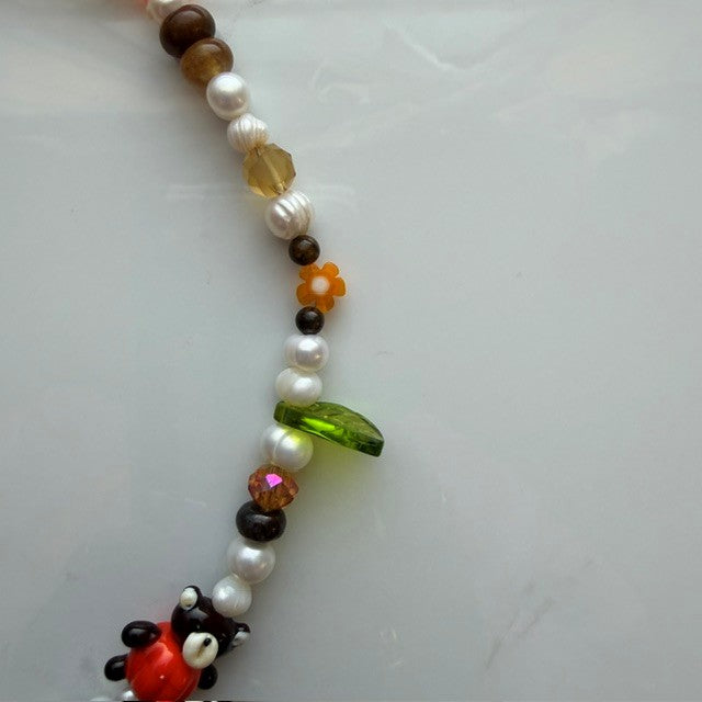 trick or teddy • half beaded half pearl necklace
