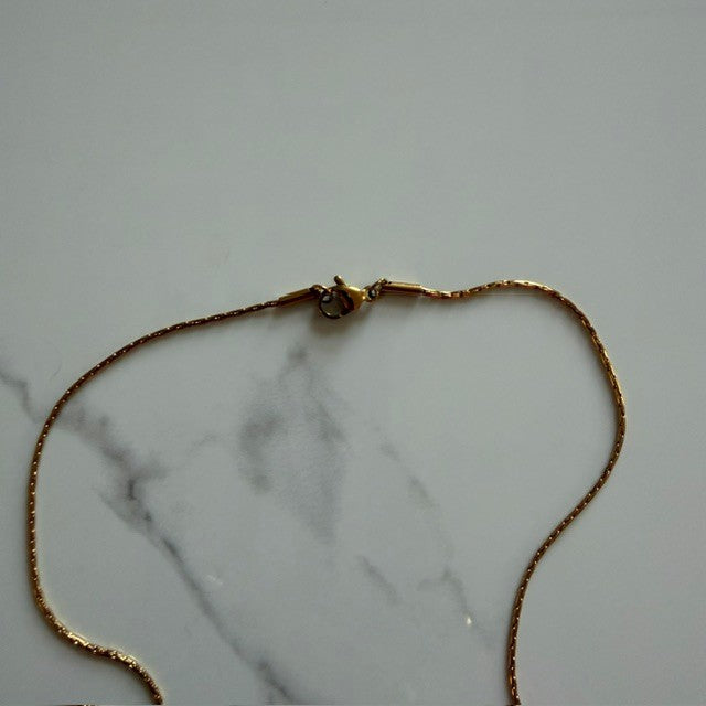 bow tie ghost · gold plated snake chain