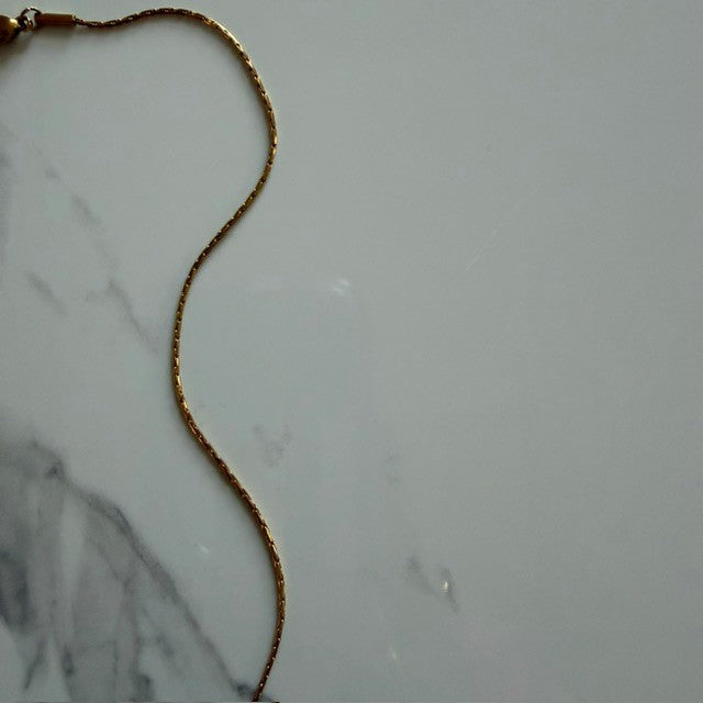 bow tie ghost · gold plated snake chain