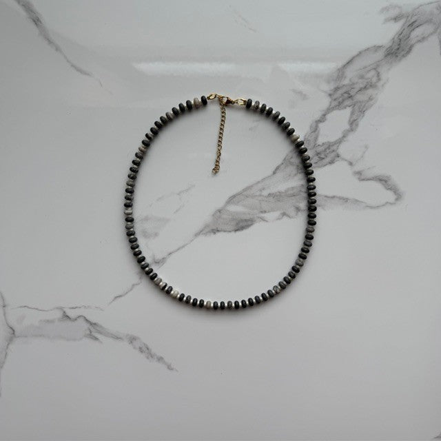 the void • black network beaded necklace