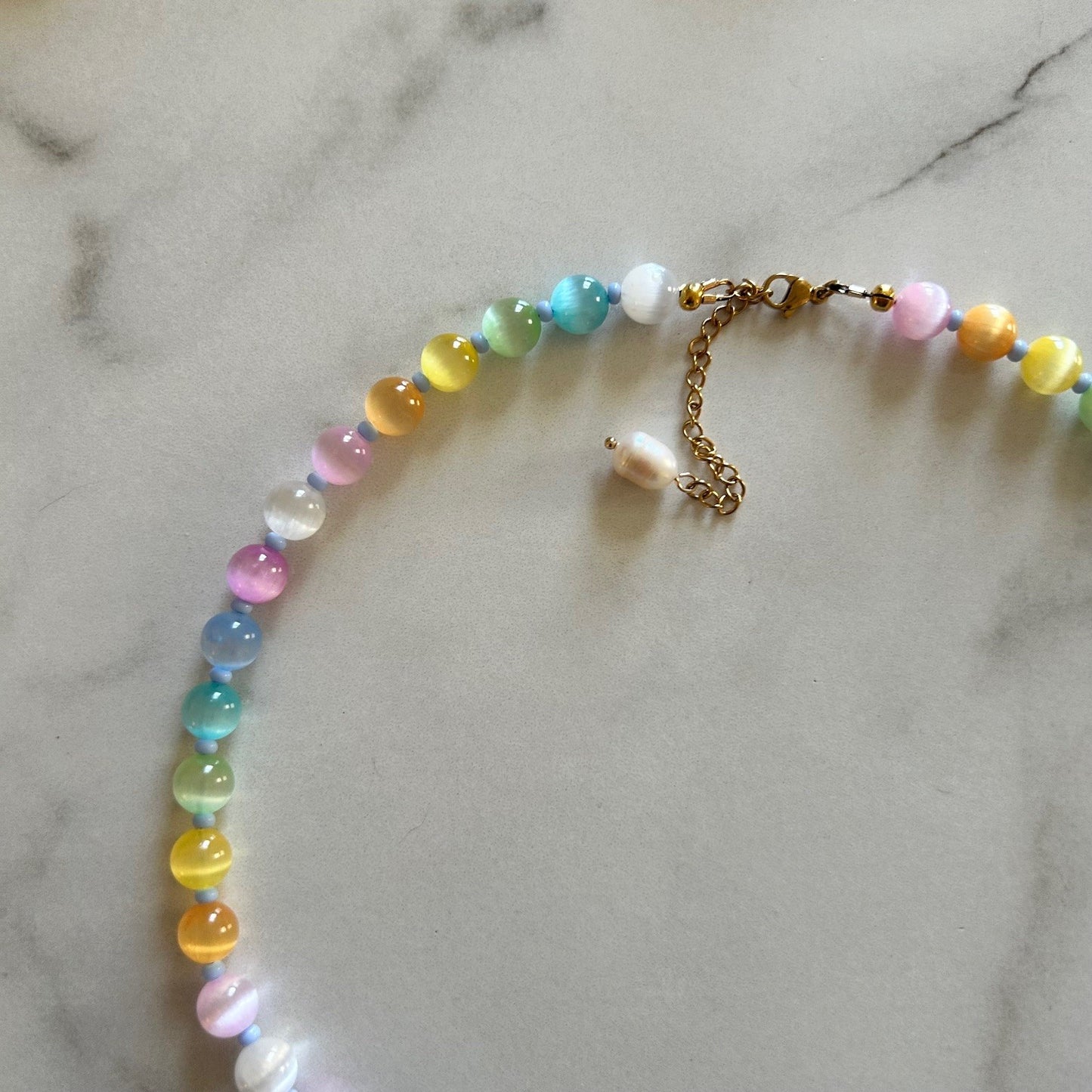 cordelia • pastel rainbow cat eye’s beaded necklace