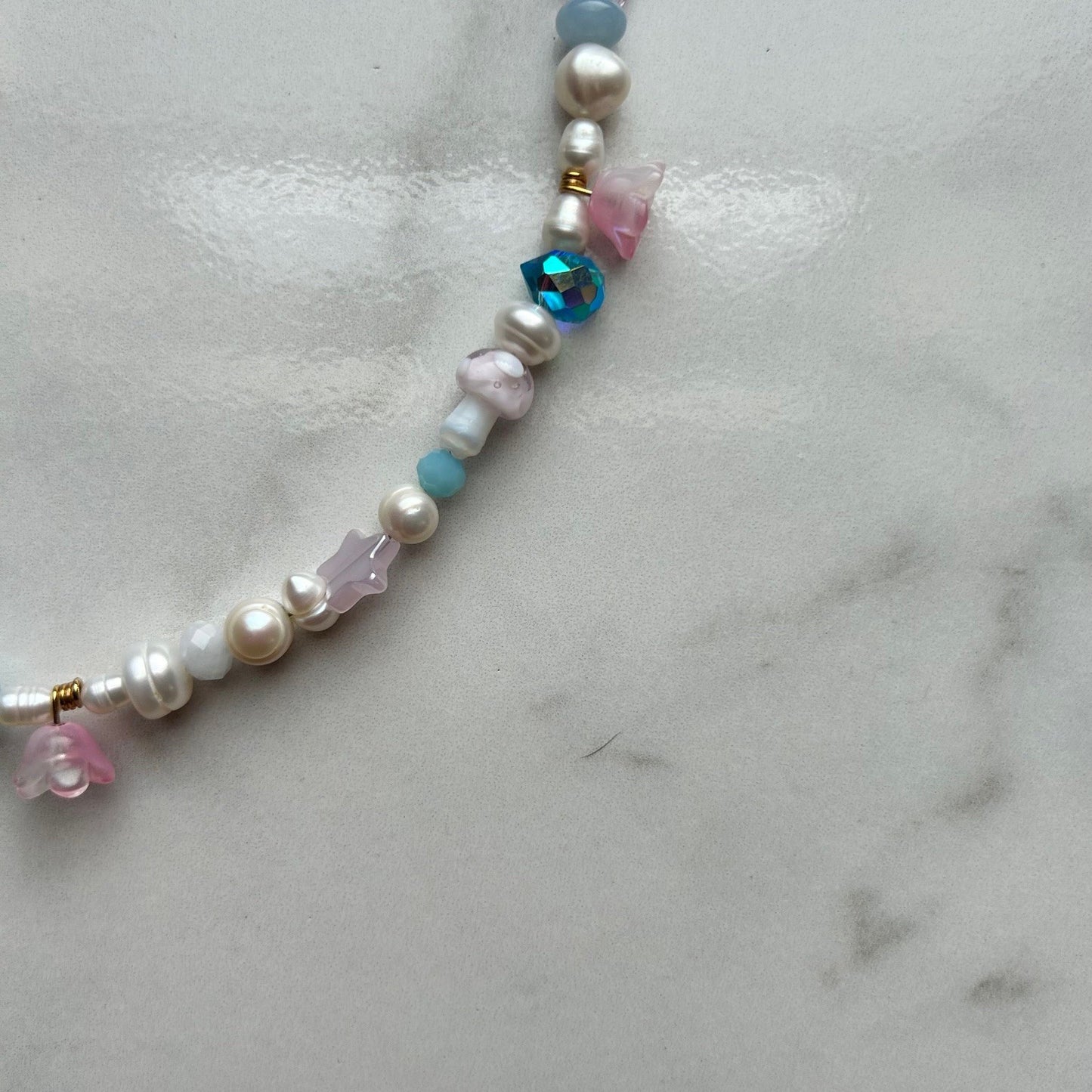neptune • half beaded half pearl