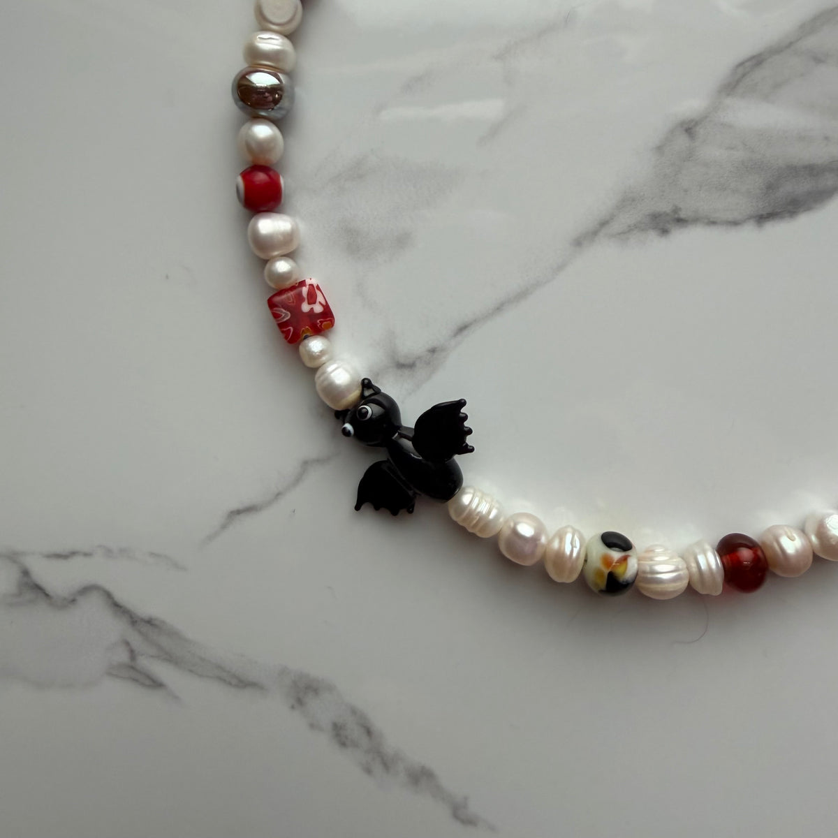 nightwing • half beaded half pearl necklace